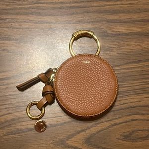 Chloe Alphabet Small Round
Coin Purse in Caramel Brown